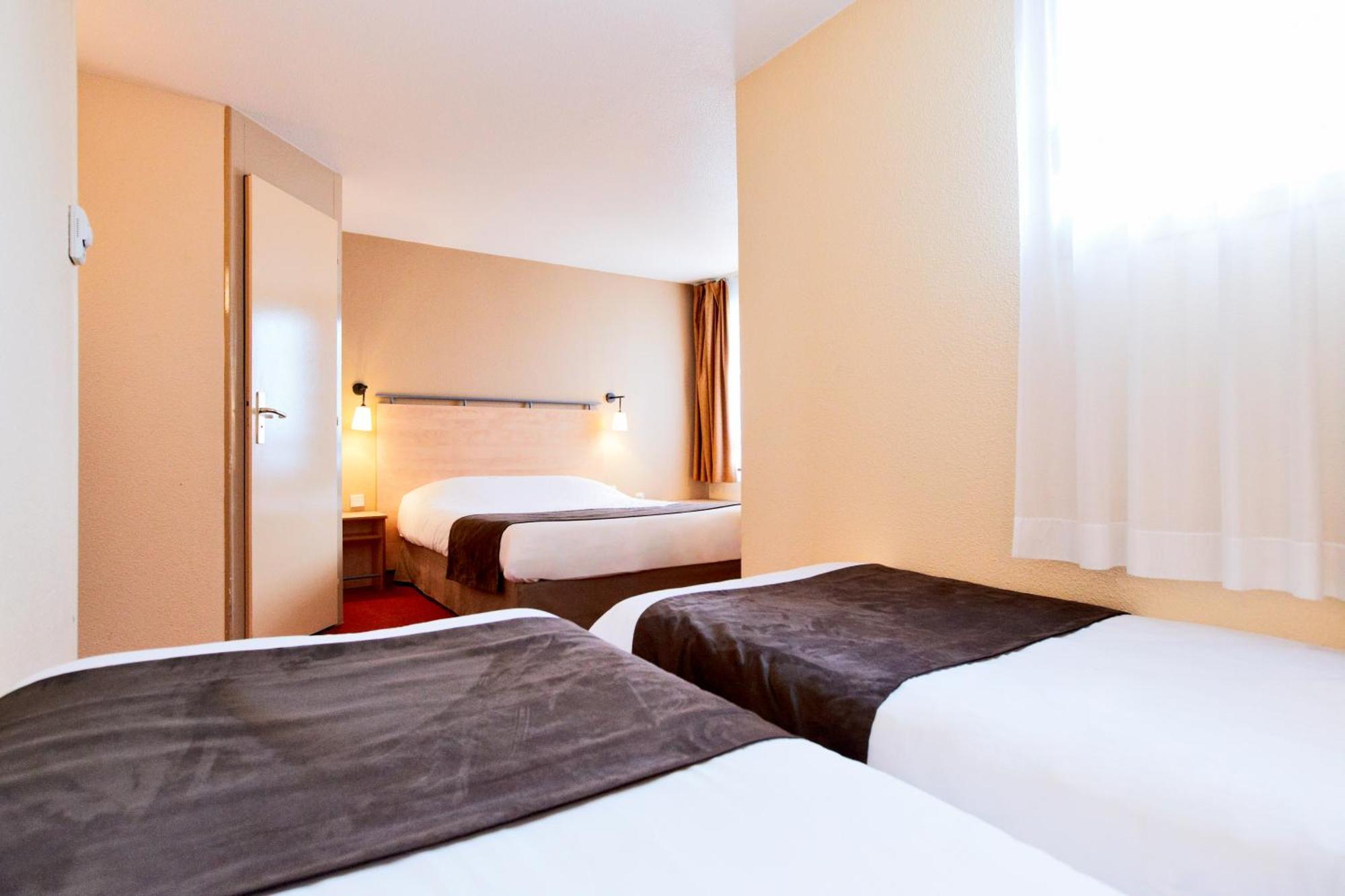 Quadruple Room 1 Double Bed 2 Single Beds