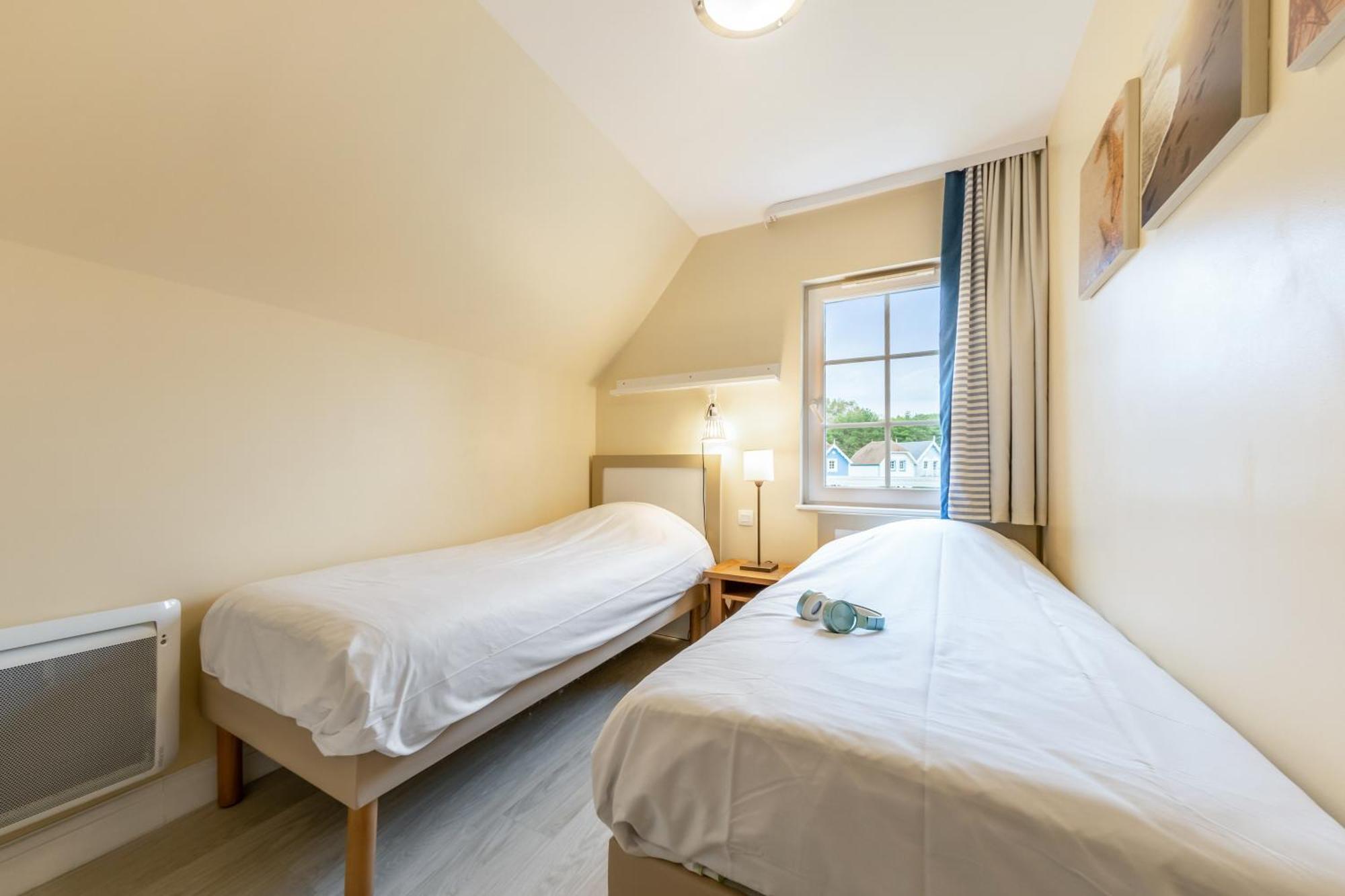 Two-Bedroom House Terrace Maisons de la Plage Area