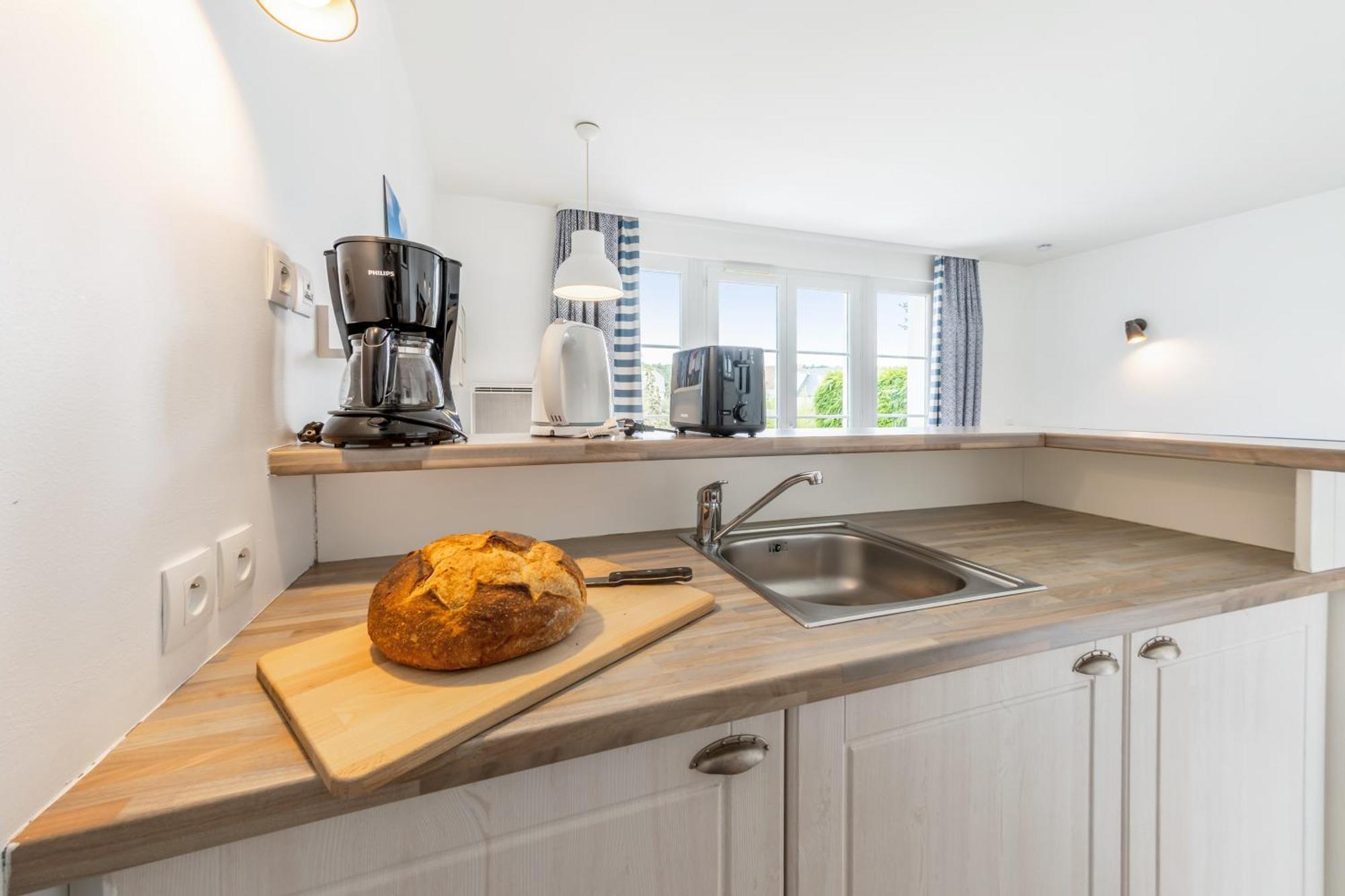 Two-Bedroom House Terrace Maisons de la Plage Area