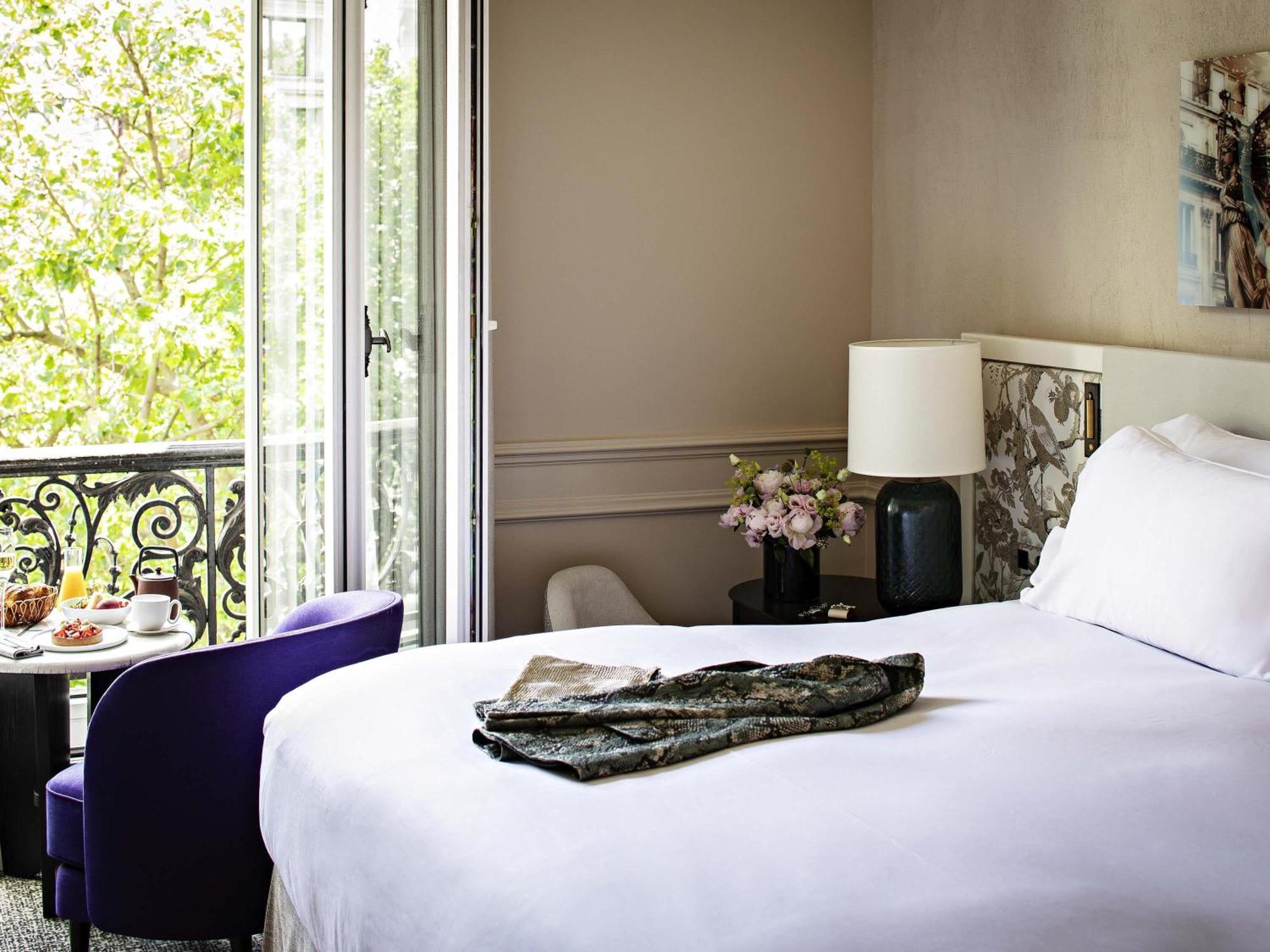 Luxury Queen Room One Queen Bed Courtyard or Rue Scribe View