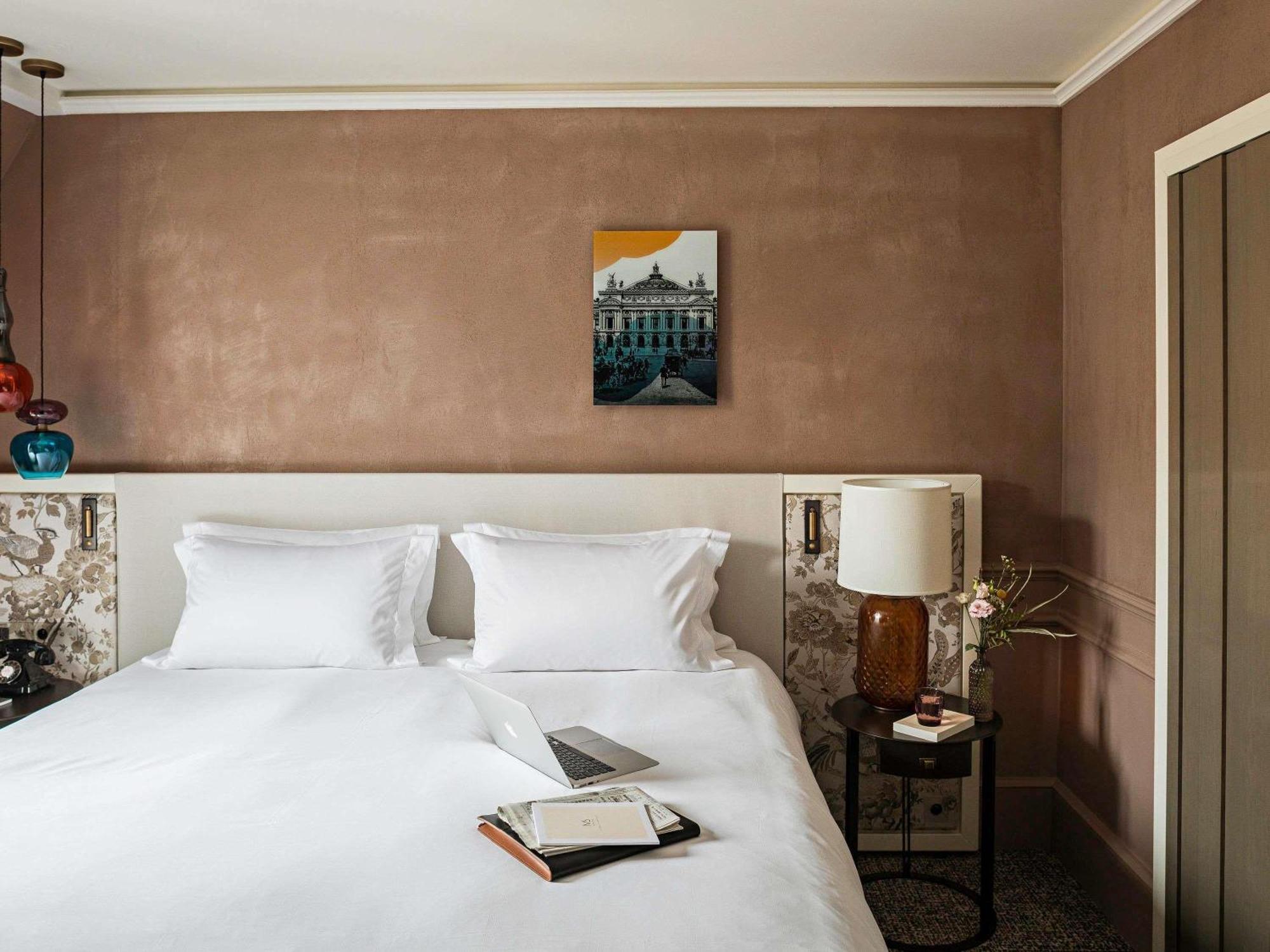Luxury Queen Room One Queen Bed Courtyard or Rue Scribe View
