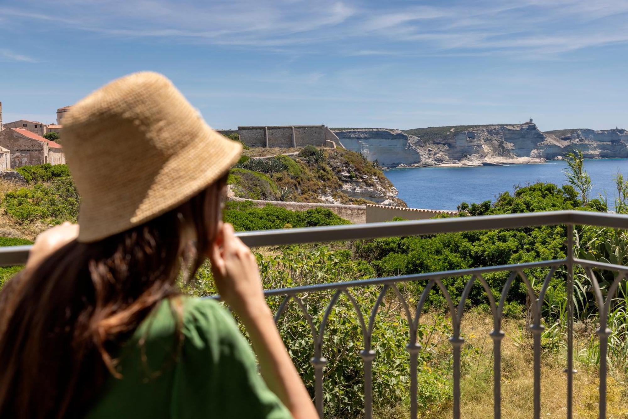 Junior Suite Balcony View of the Upper Town the Cliffs the Sea